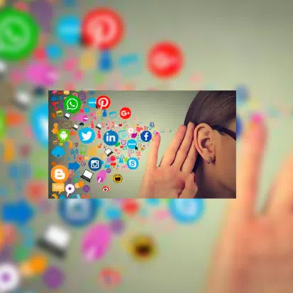 Person listening to floating social media icons