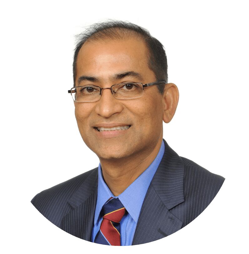 Smiling man in suit and tie headshot